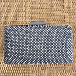 Olga Berg Metallic Silver Clutch